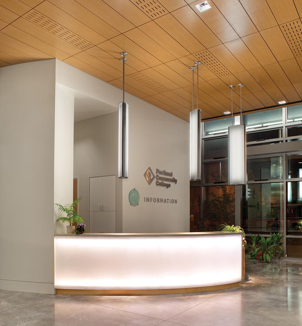Air Foil education lighting fixtures hung above a college reception area.