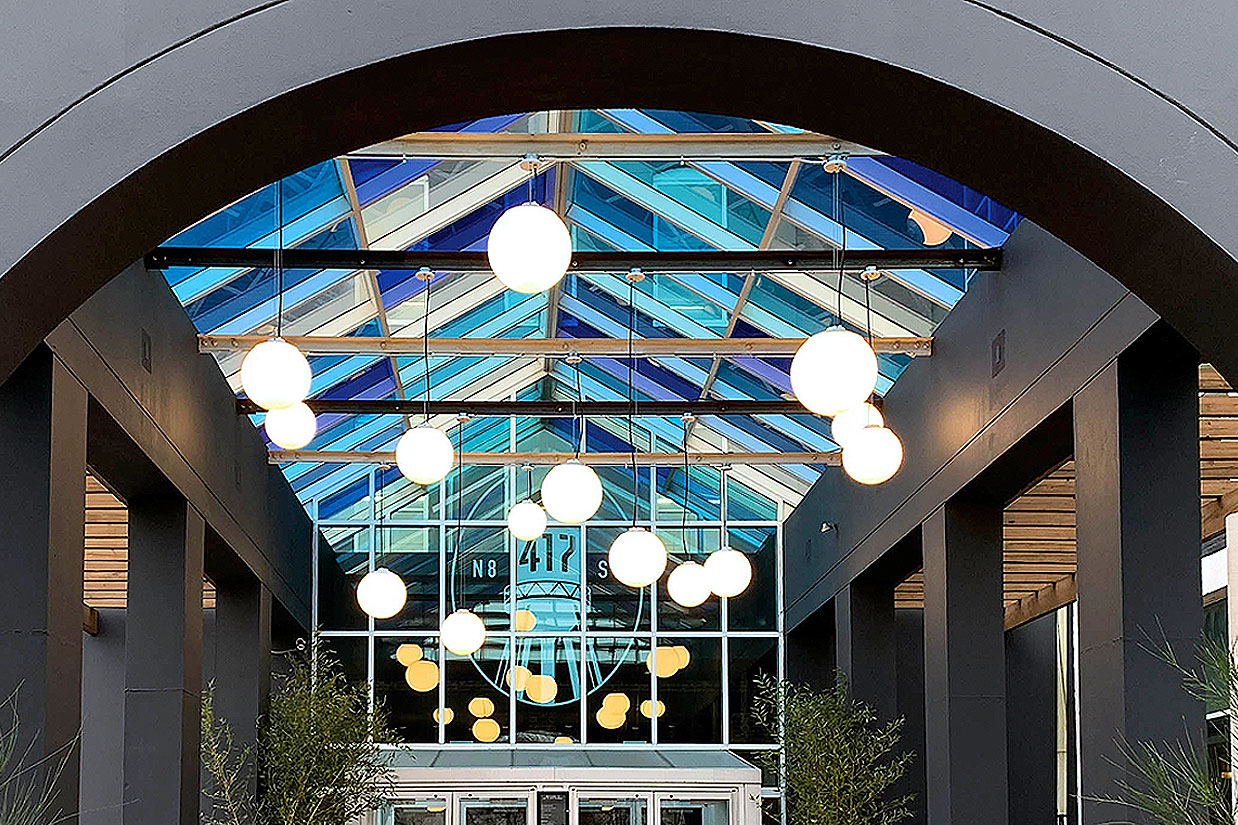 Zume Globe Style Indoor Pendant  at buildings entry